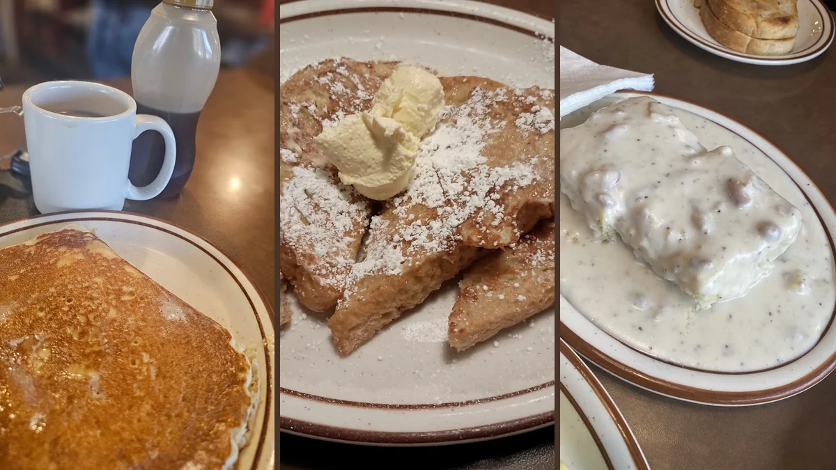 Breakfast plates on a cozy restaurant table.